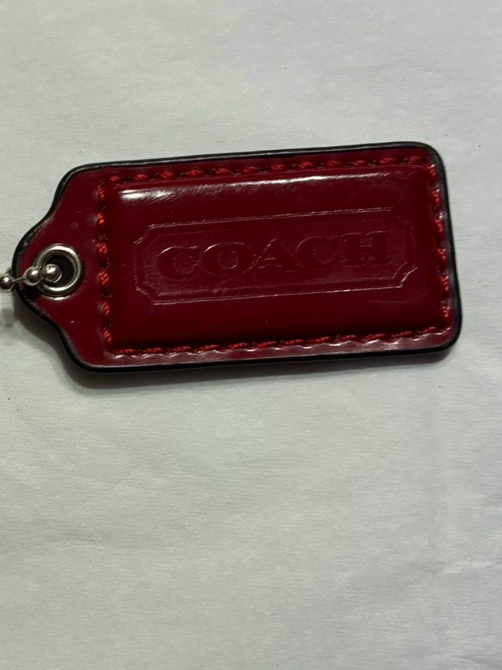 Coach EUC Red Patent Leather Hang Tag